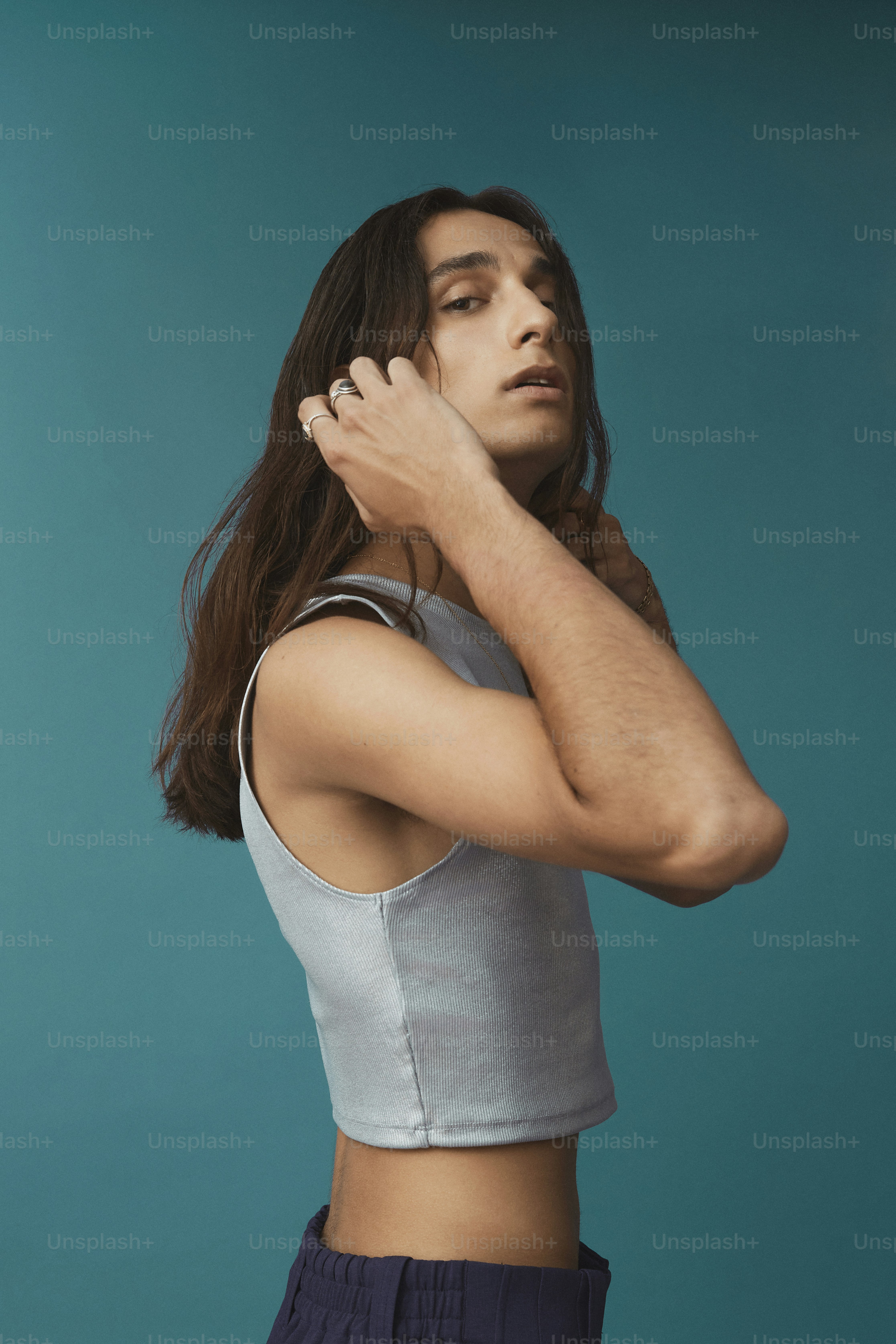 a woman with her arm around her neck