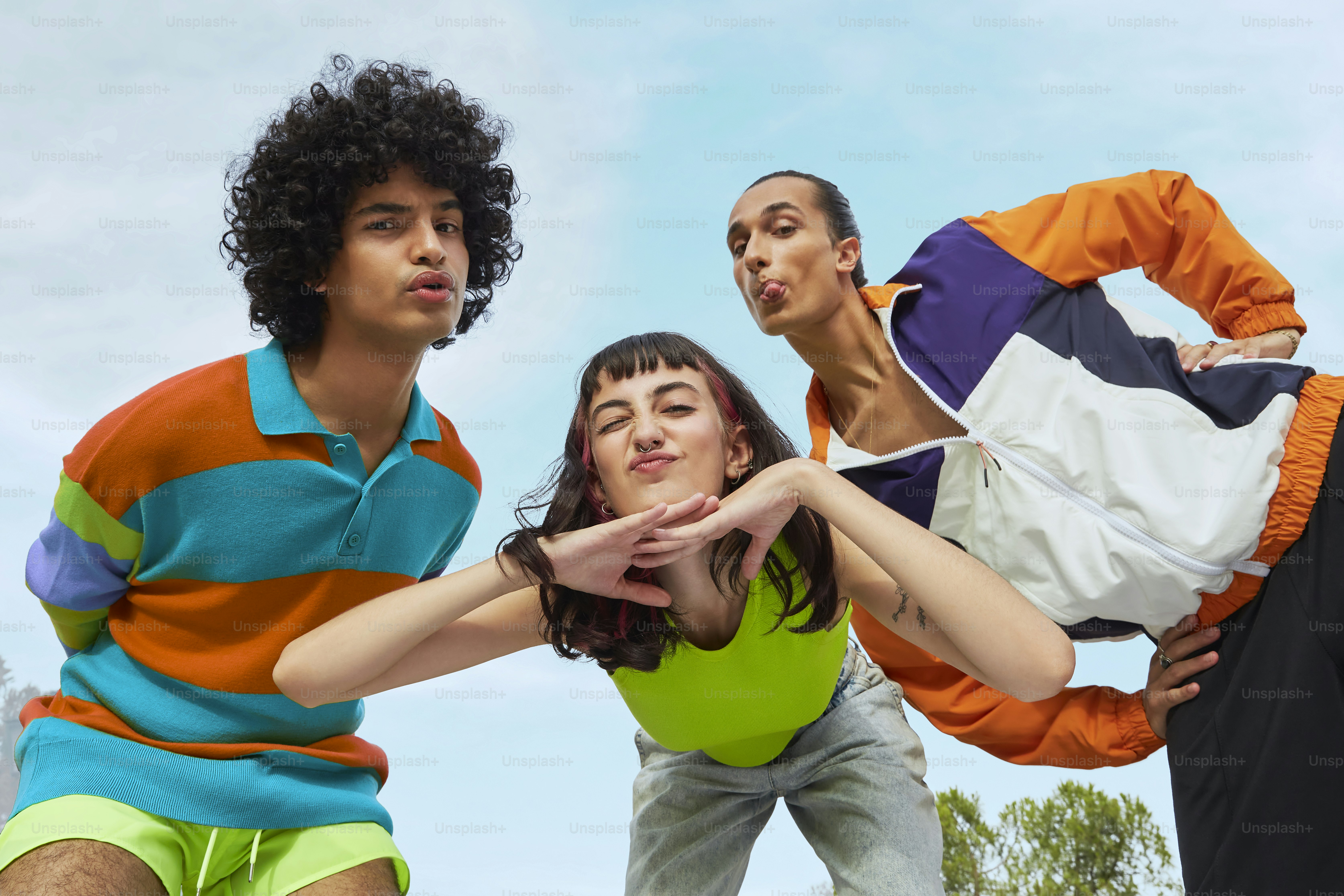 a group of young people standing next to each other
