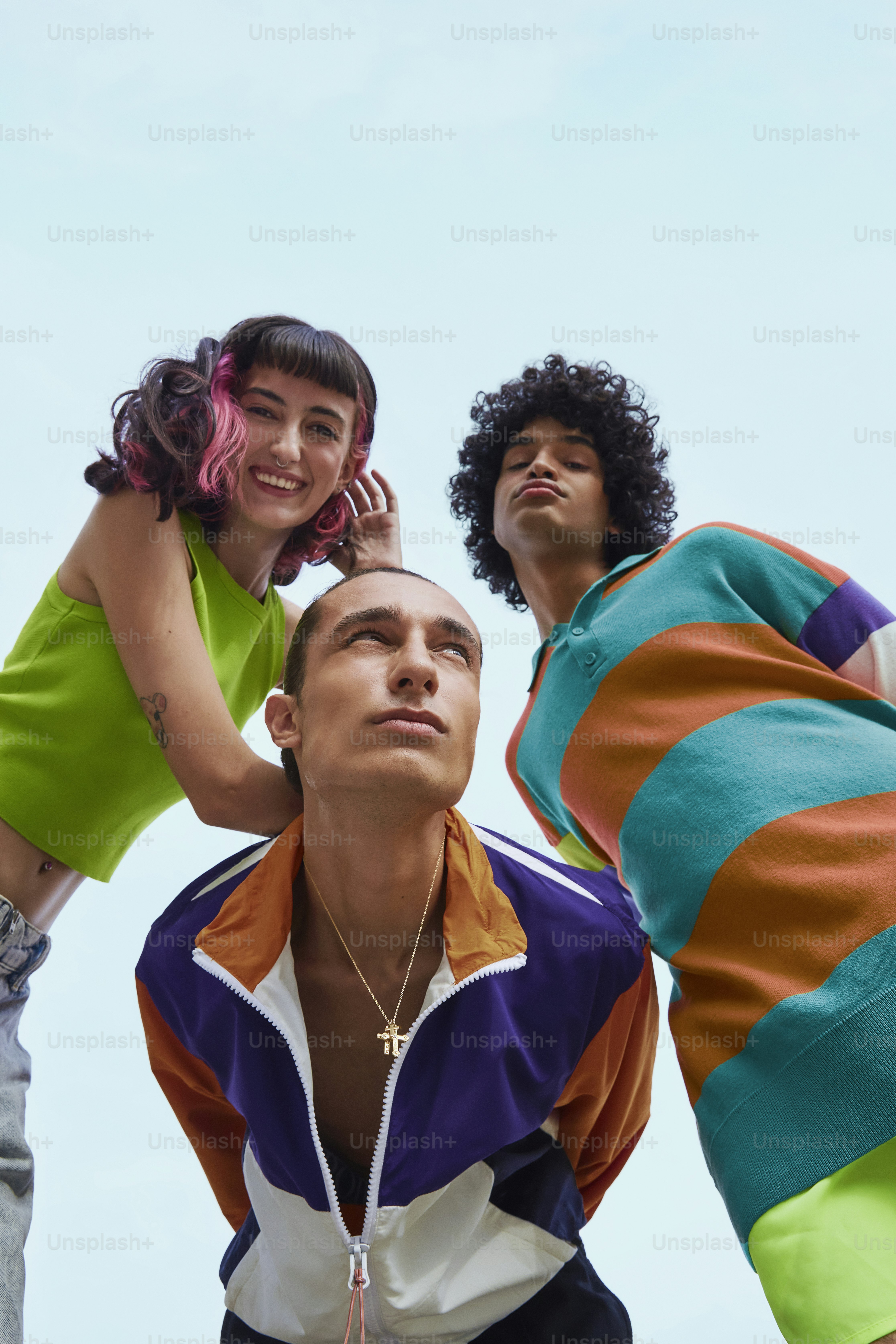 a group of people standing next to each other