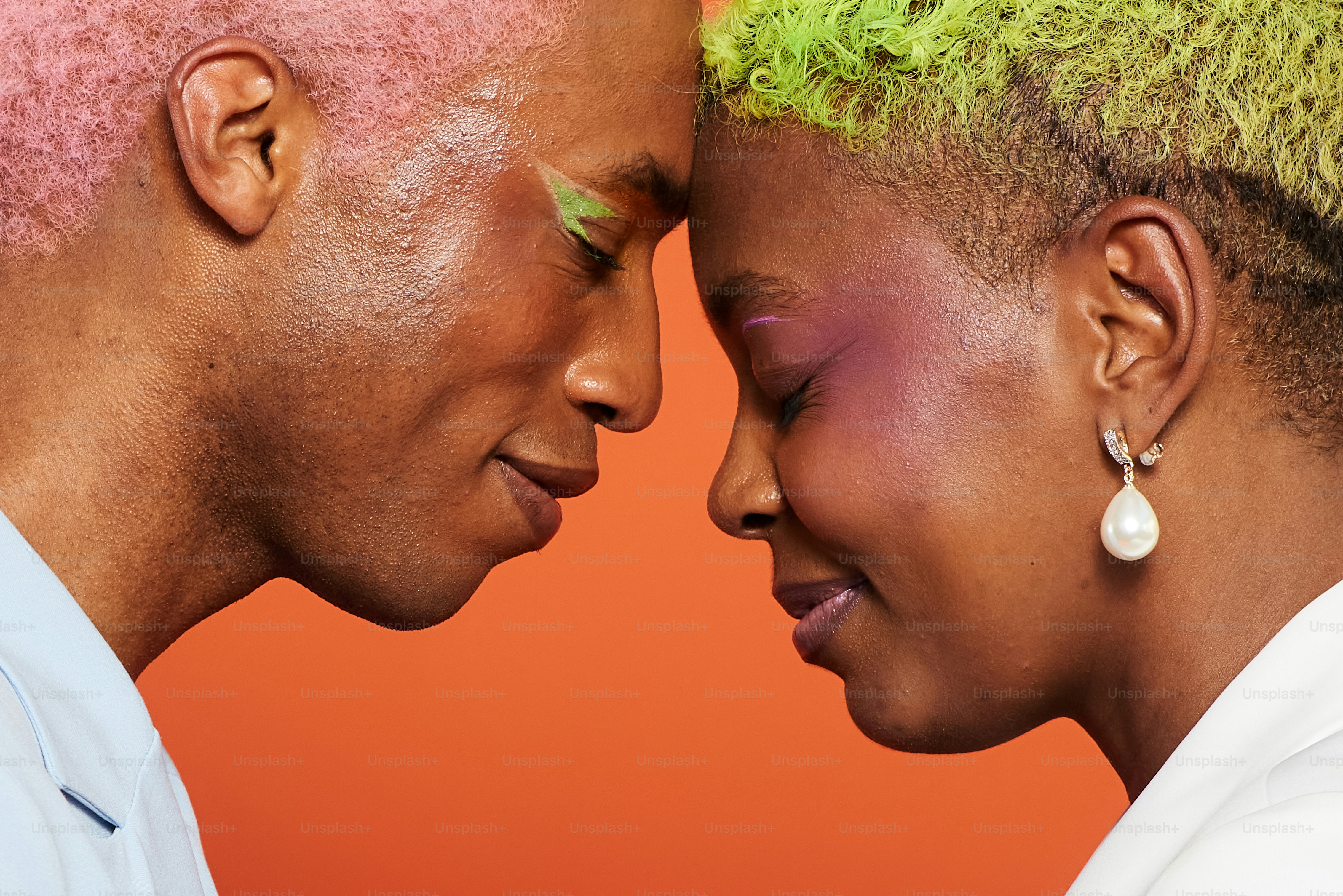 A couple of people that are hugging each other photo Happy Image on Unsplash