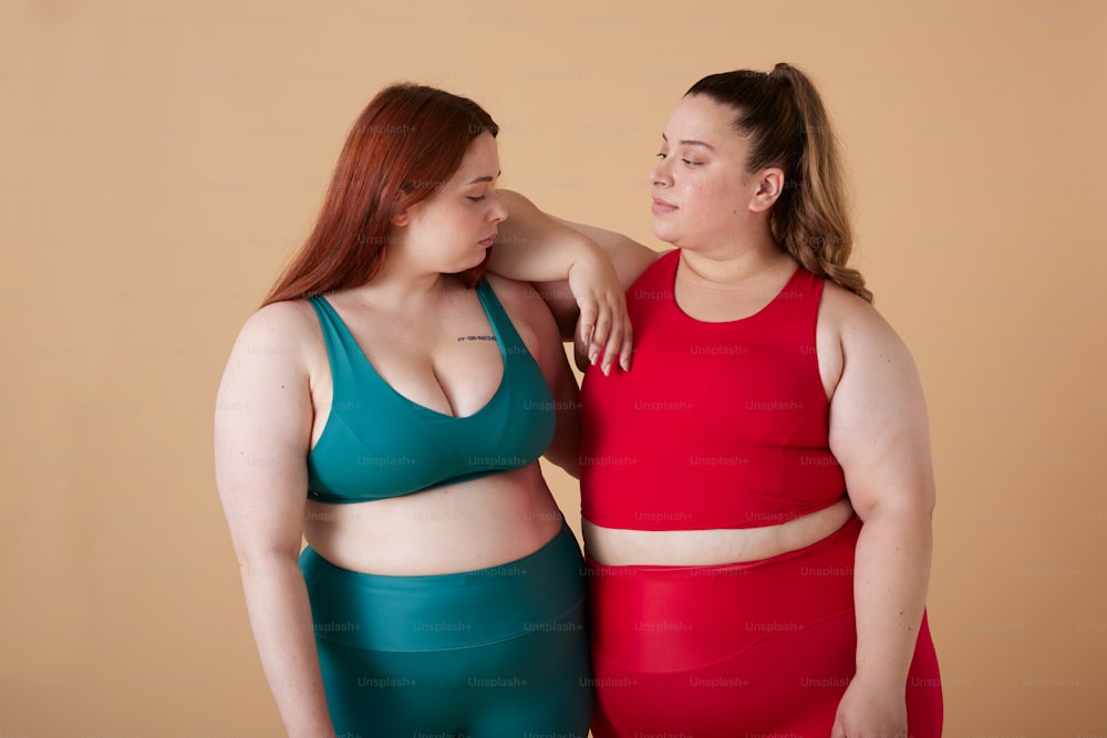 a couple of women standing next to each other