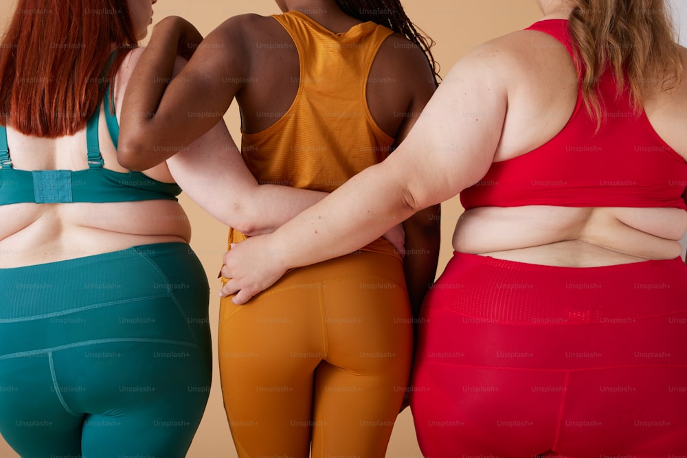 a group of women standing next to each other