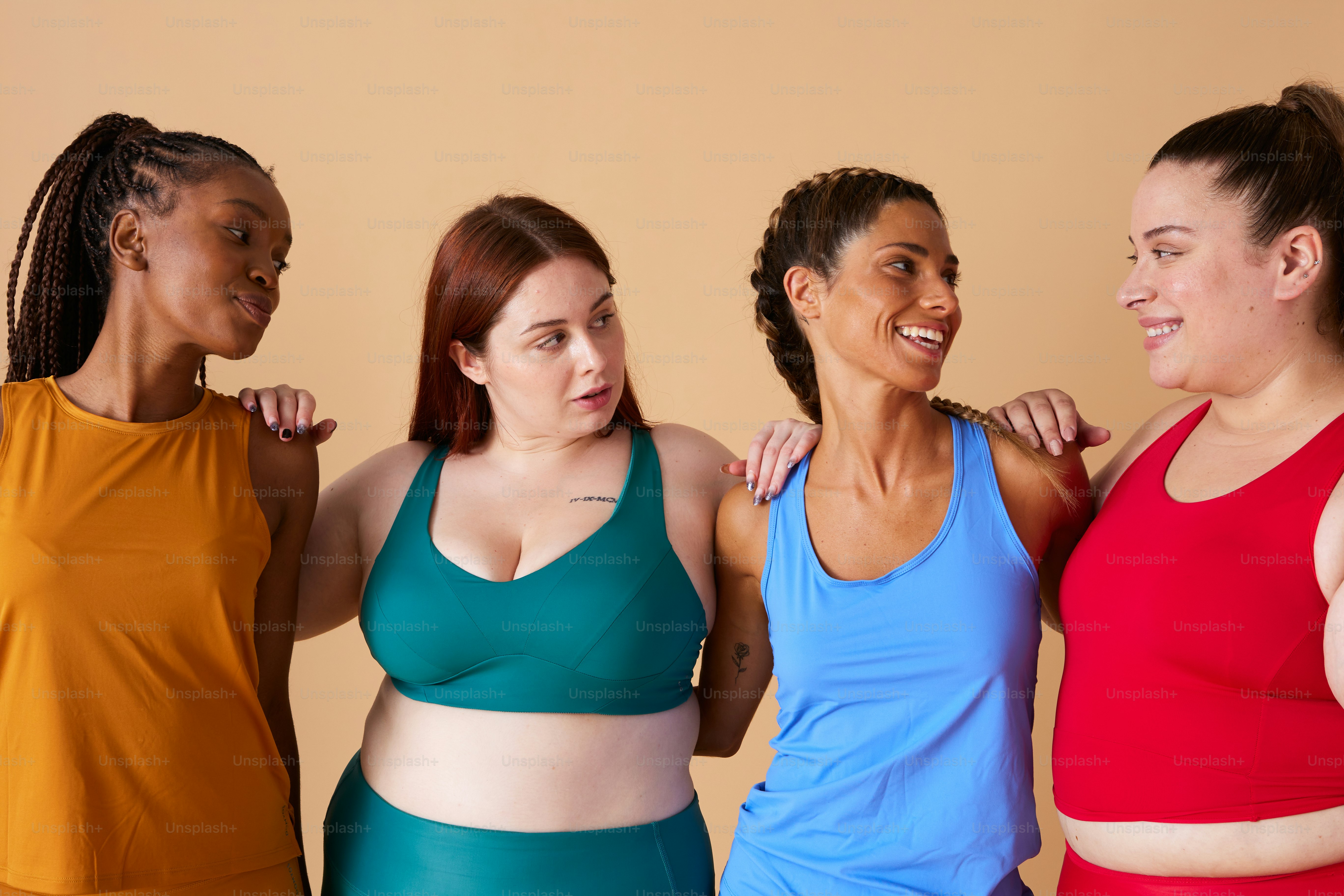 a group of women standing next to each other