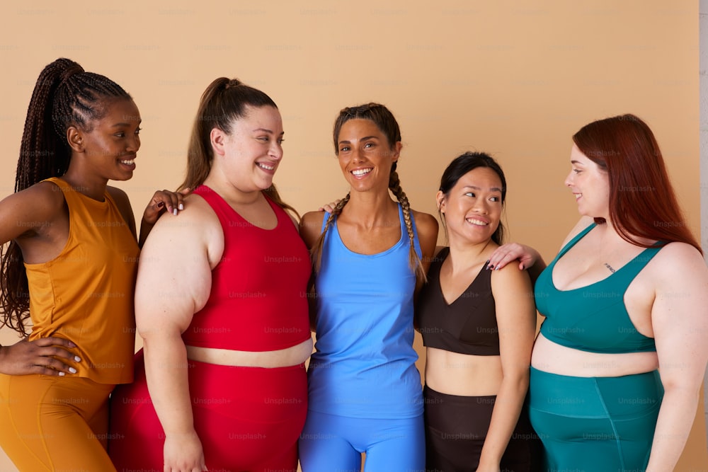 a group of women standing next to each other