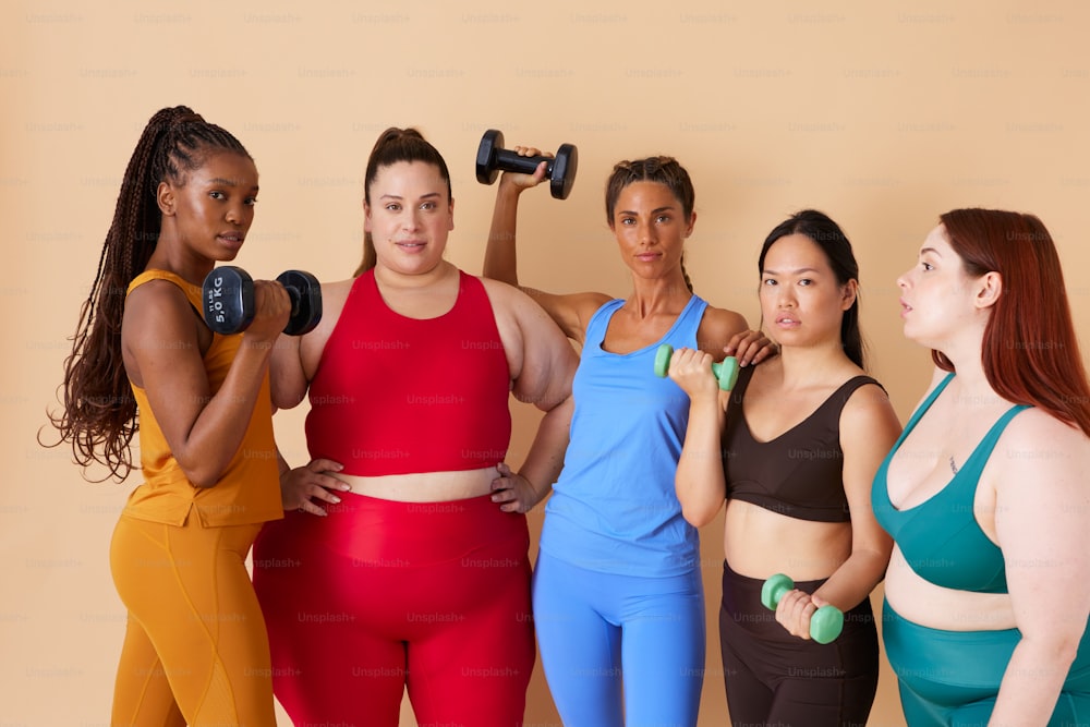 a group of women standing next to each other