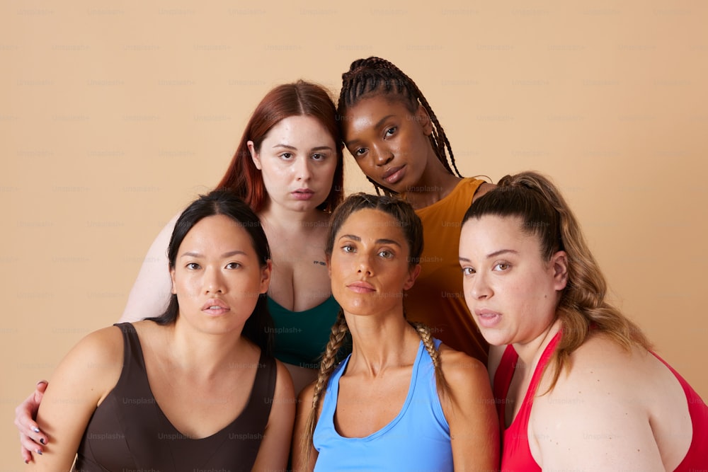 a group of women standing next to each other