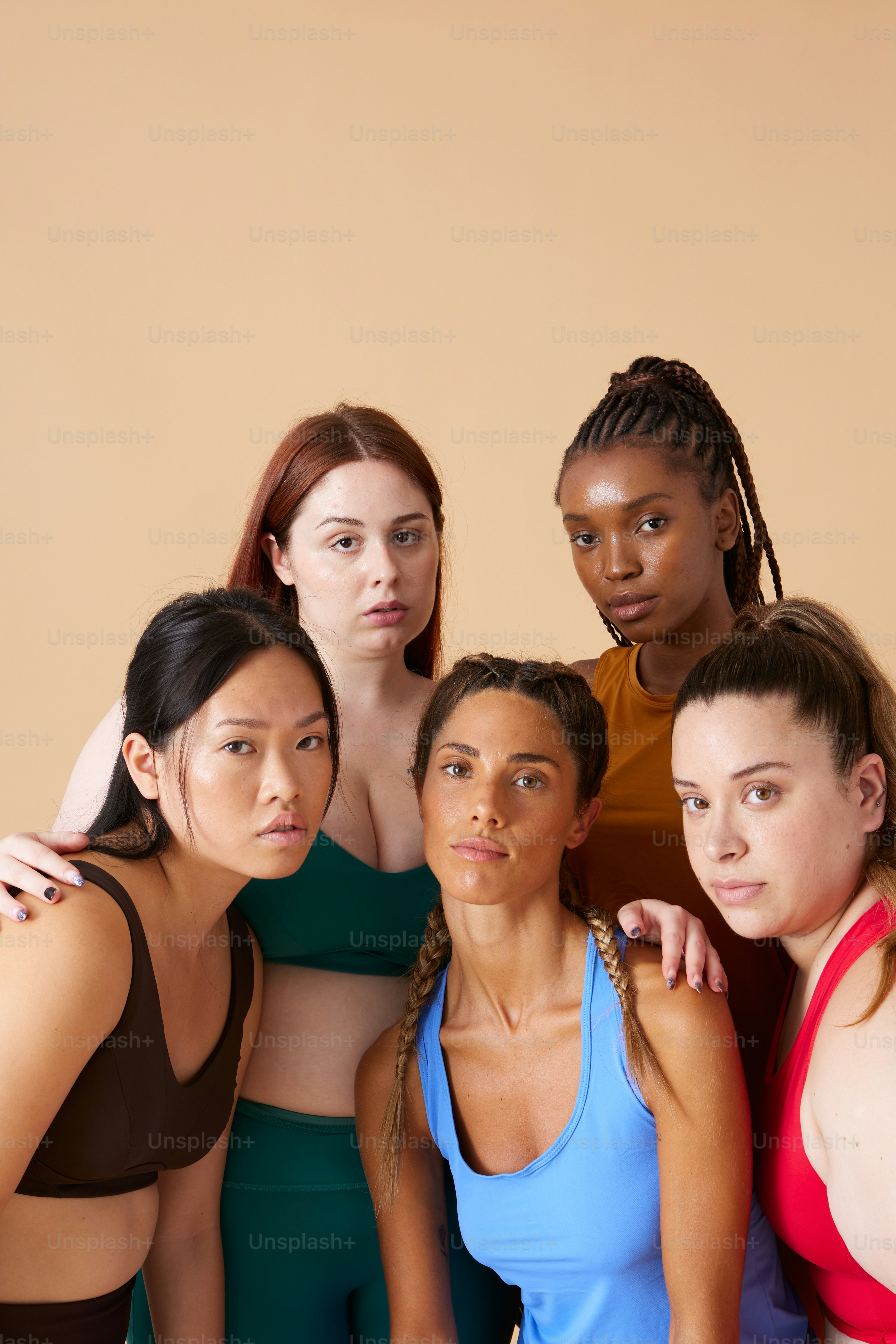 a group of women standing next to each other