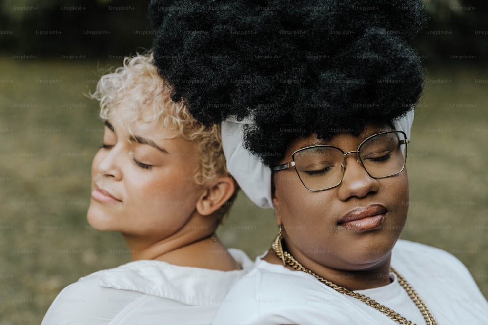 a couple of women standing next to each other