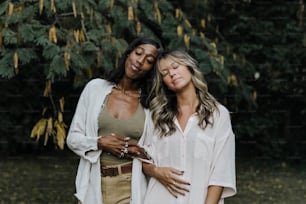 a couple of women standing next to each other