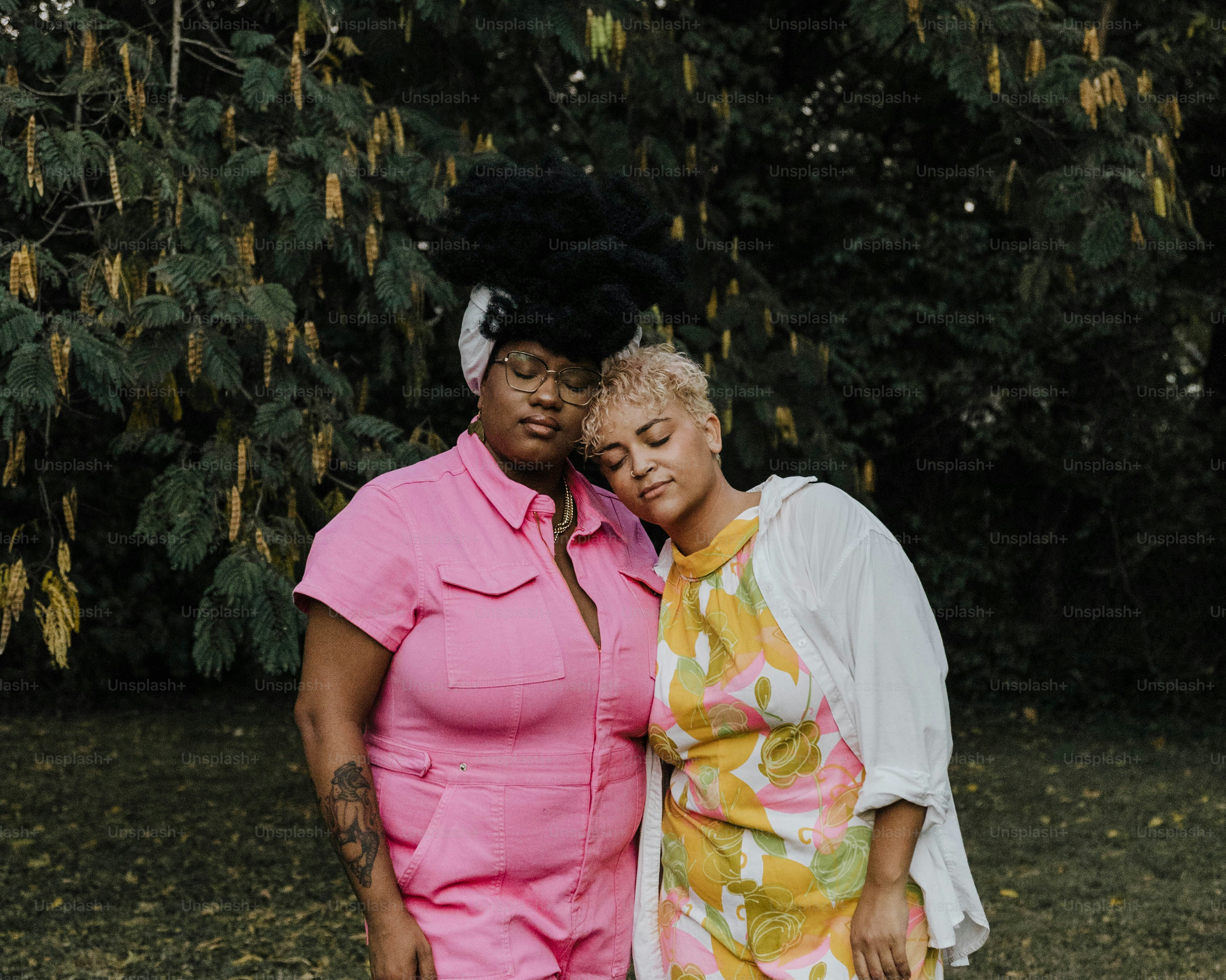 a couple of women standing next to each other