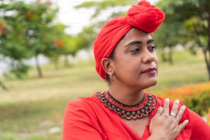 Portrait of an older Afro woman in the park