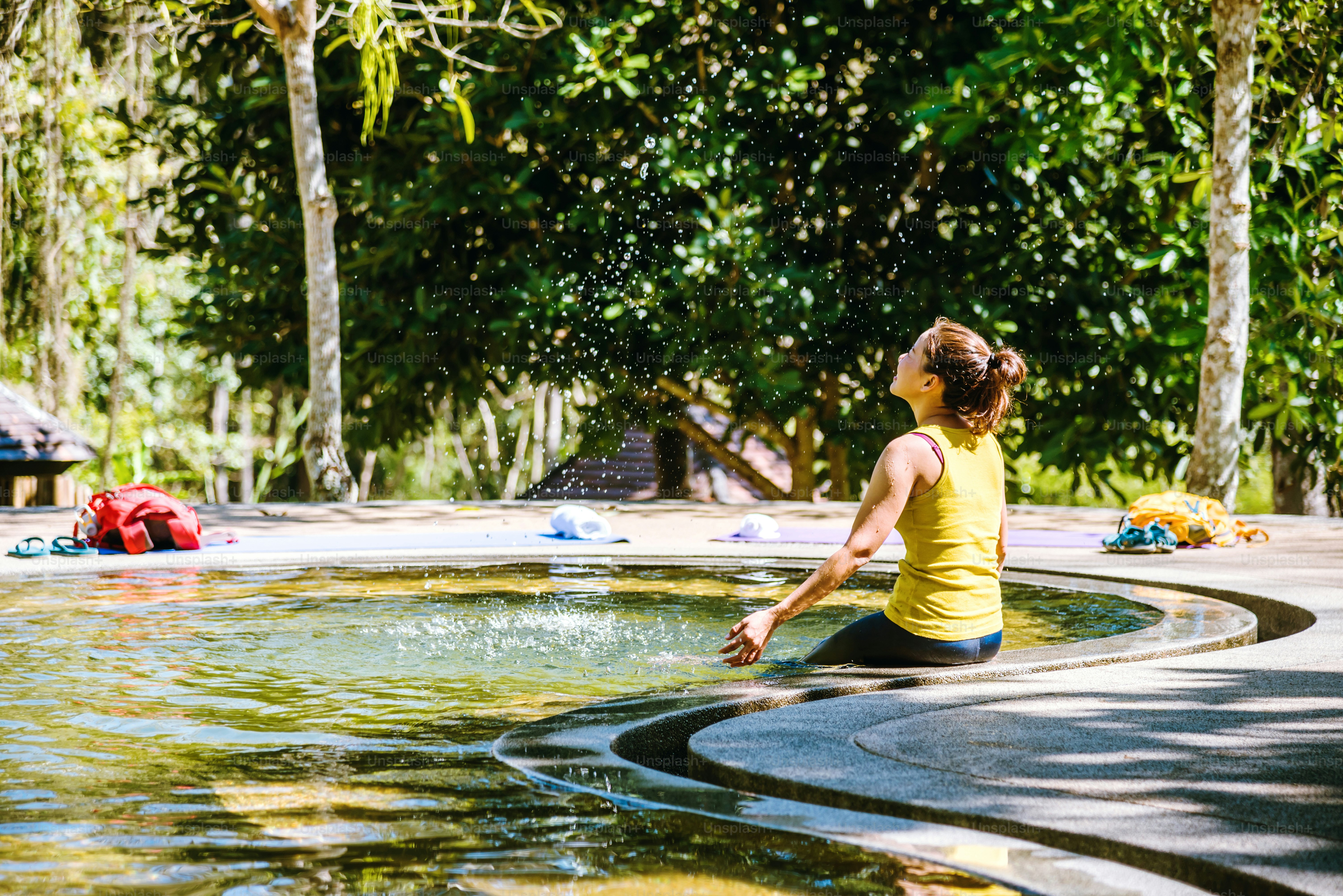 Girl in a pool hot spring in Thailand,Natural Mineral Water,Hot Springs In National Park,Hot Spring nature travel