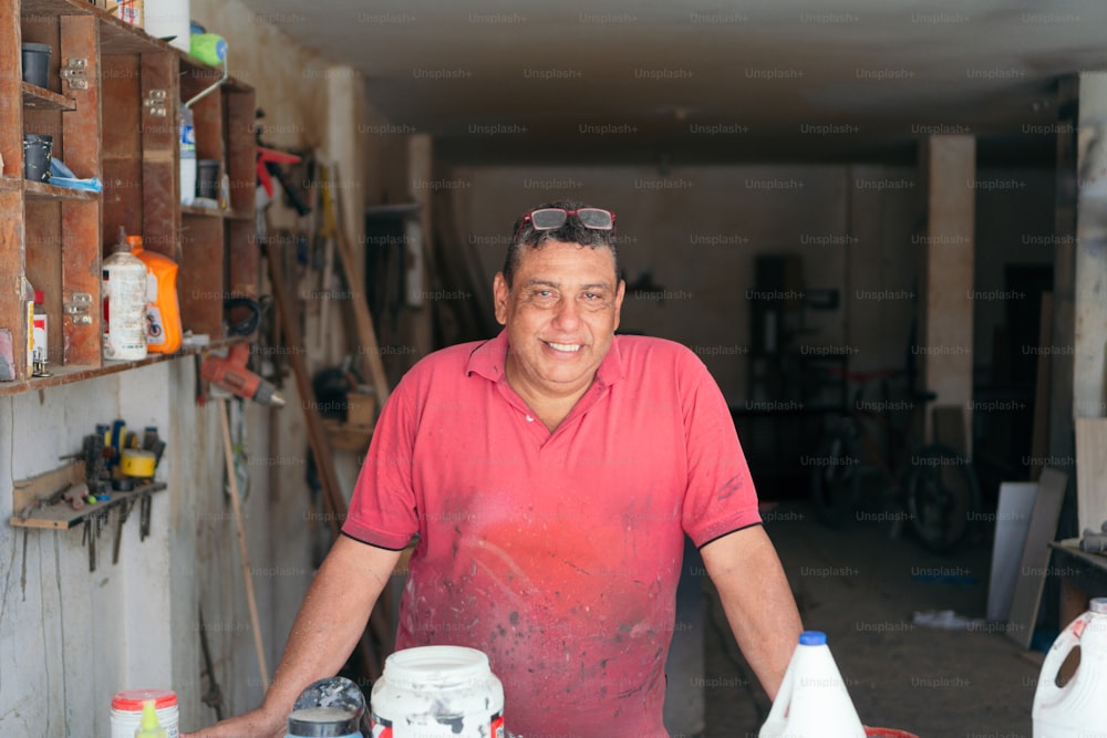 Portrait of male carpenter in workshop.