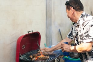 man preparing food for kids