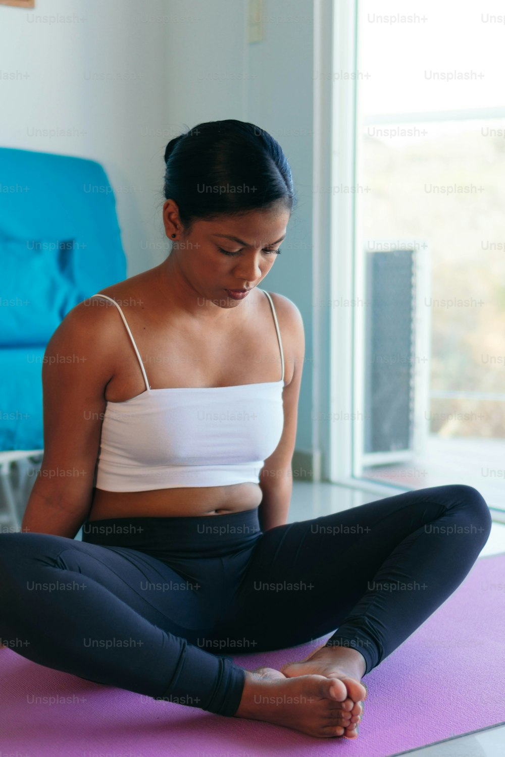 African American woman exercising at home. Workout at home.