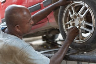 Mechanic Working In Auto Repair Shop