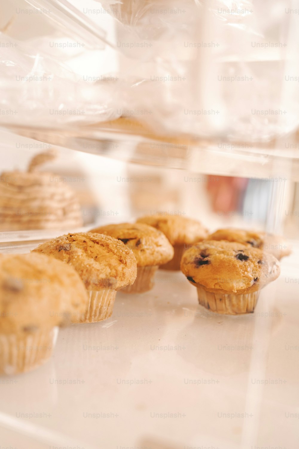 a bunch of muffins that are on a counter