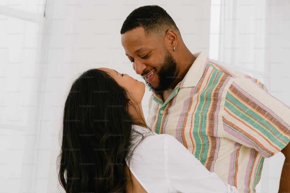 a man and a woman embracing each other