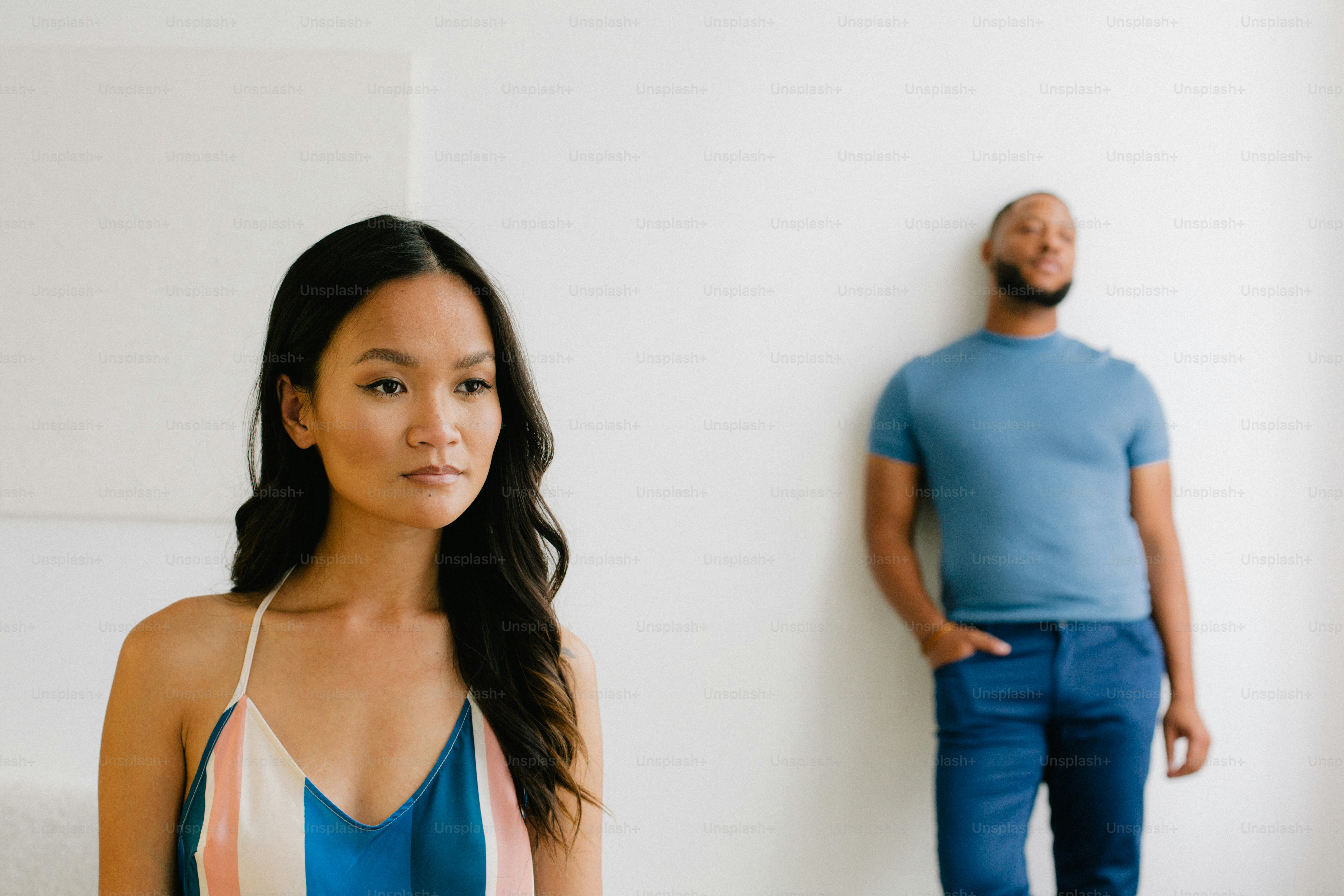 a man and a woman standing next to each other