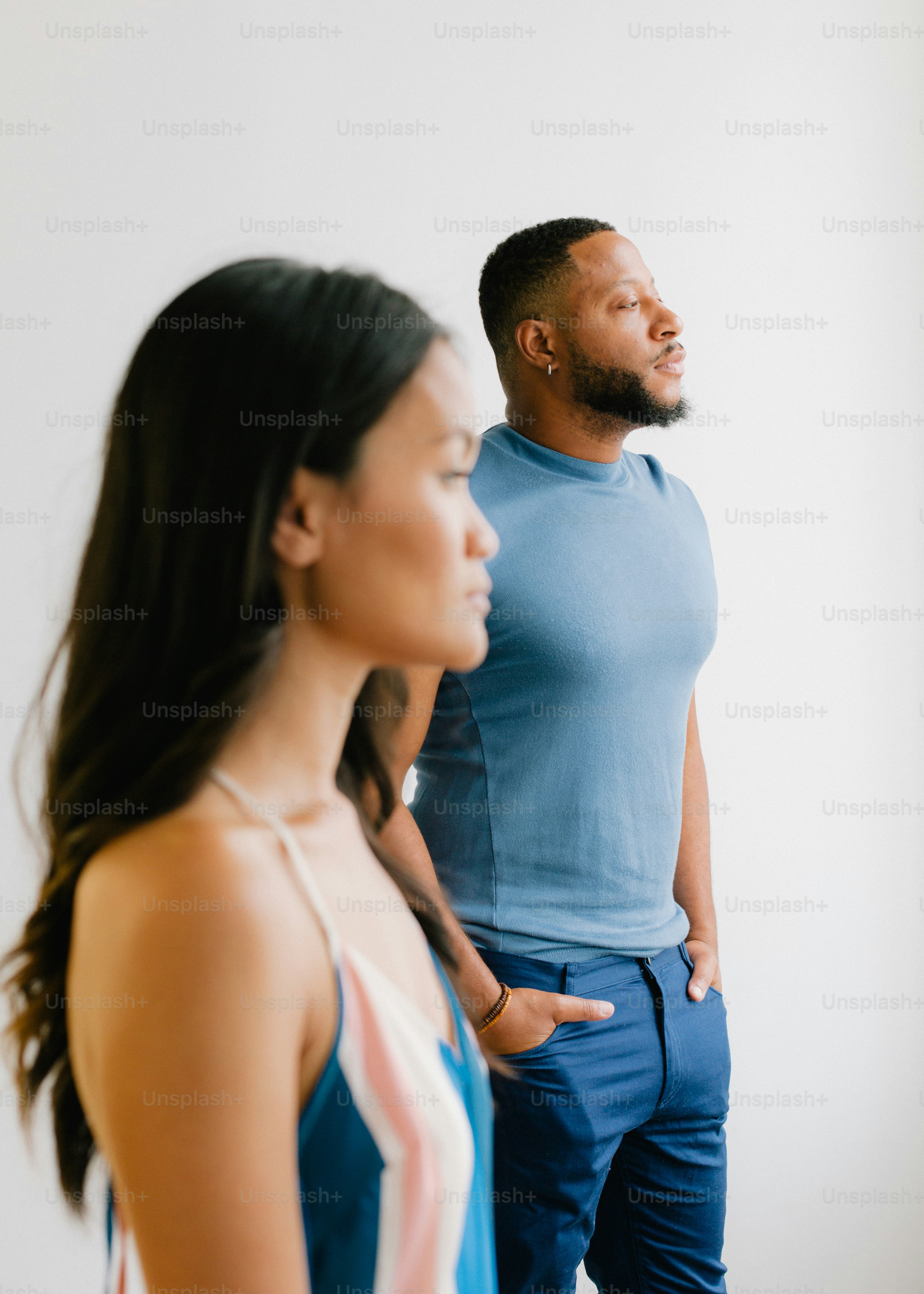 A man and a woman standing next to each other photo – Fight Image on ...