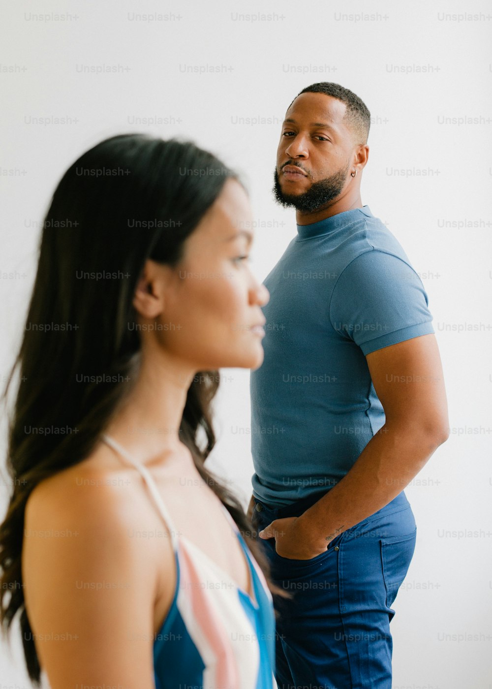 a man and a woman standing next to each other