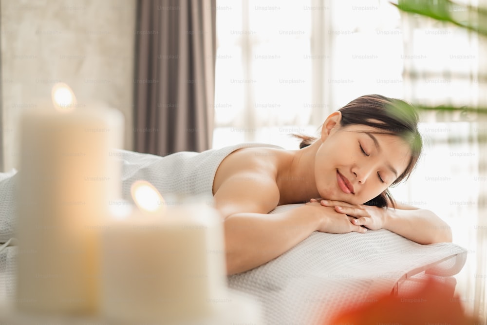 Young Asian beauty woman enjoying massage and spa