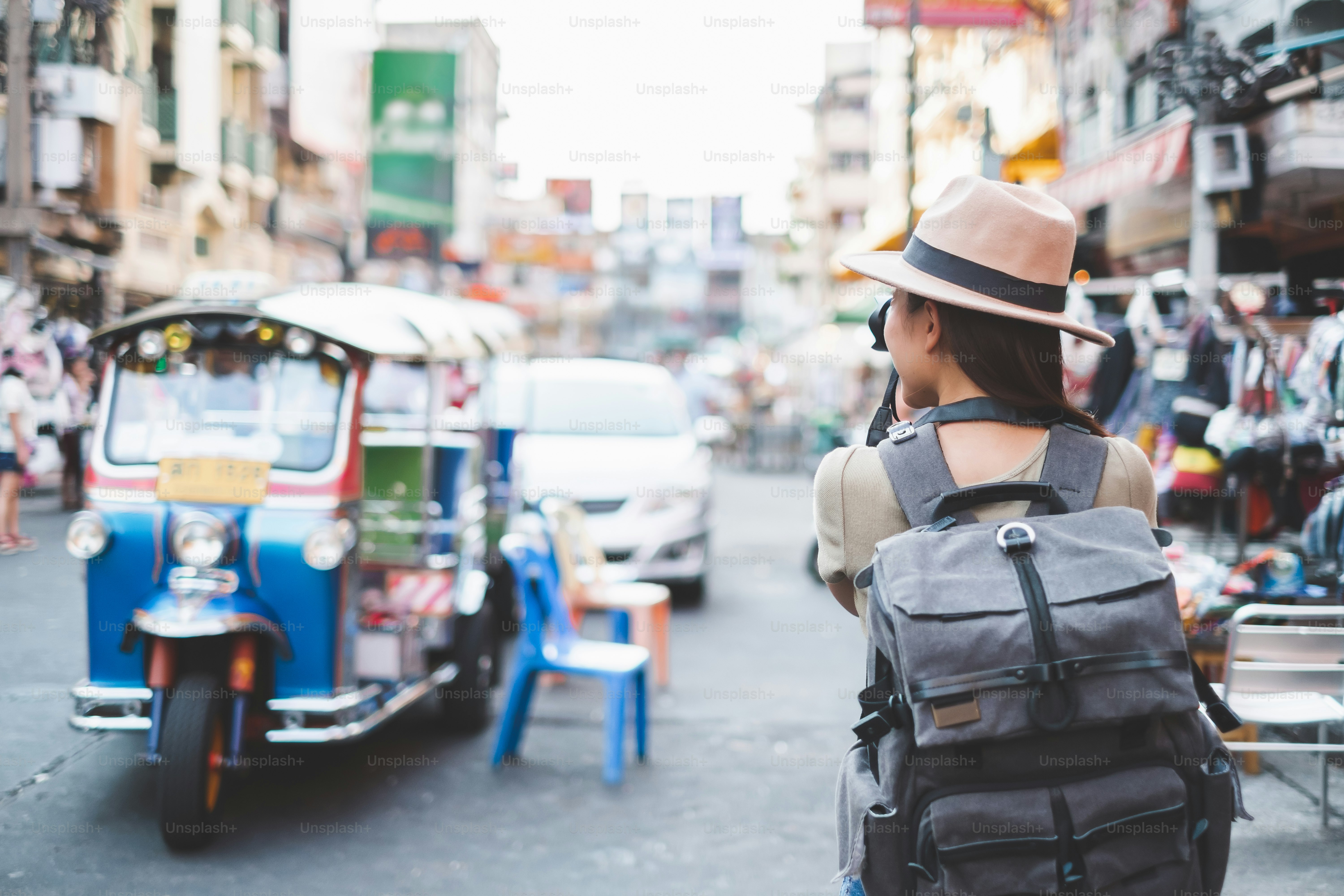 Asian traveler/tourist walking and travelling in Khao San rd. walk street, Bangkok, Thailand