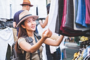 Asian traveler/tourist walking and travelling in Khao San rd. walk street, Bangkok, Thailand