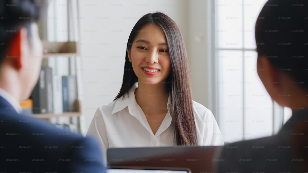 Young Asian woman talking with manager team for job interview