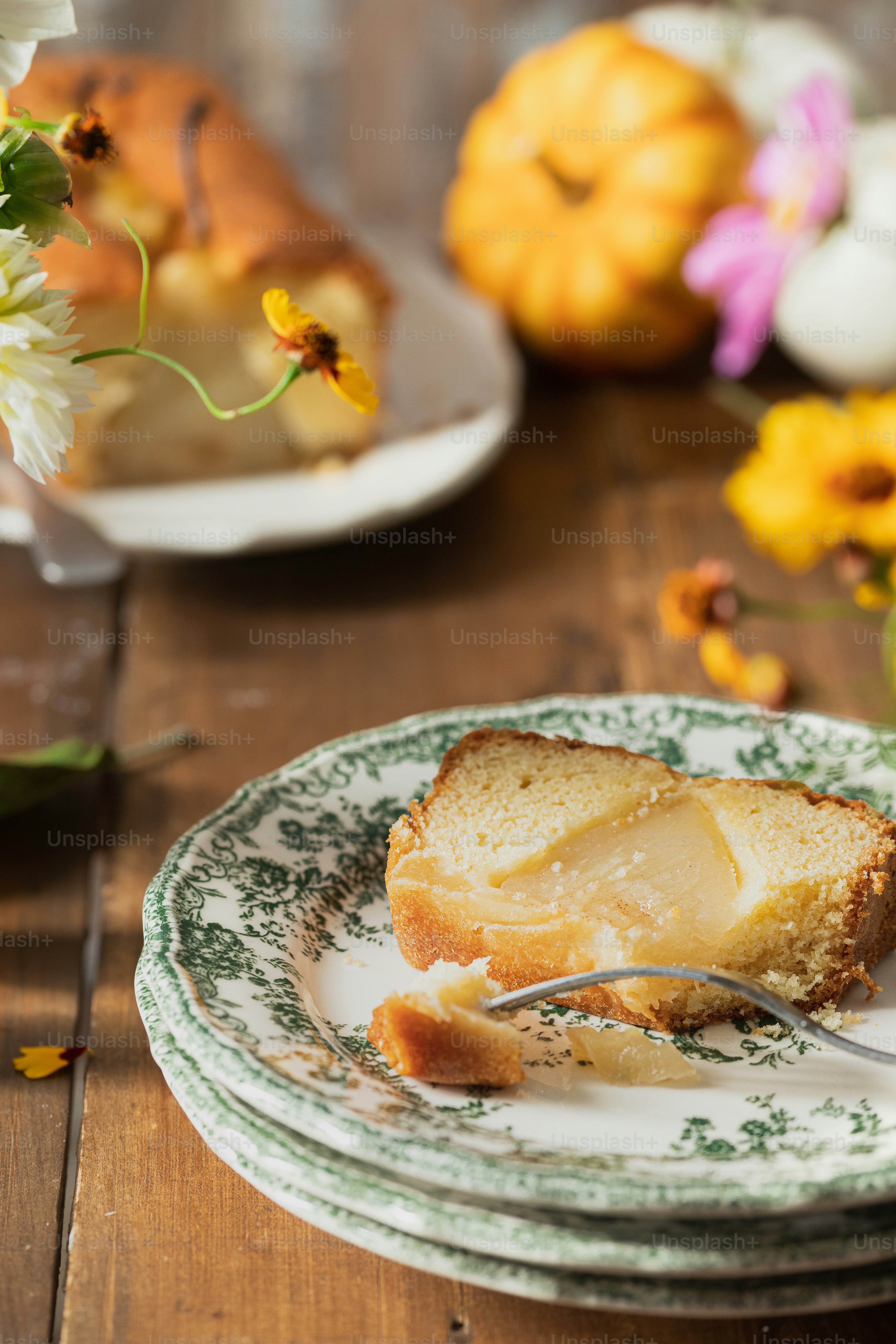 a piece of bread on a plate with a fork