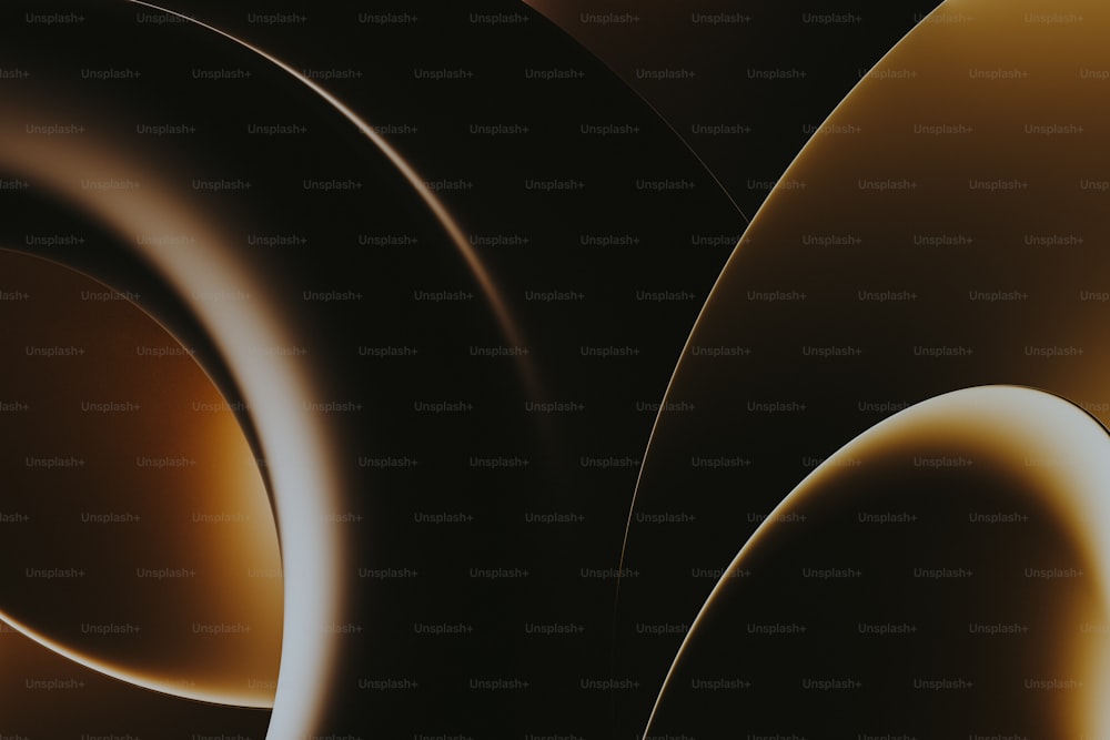 a black and gold abstract background with circles