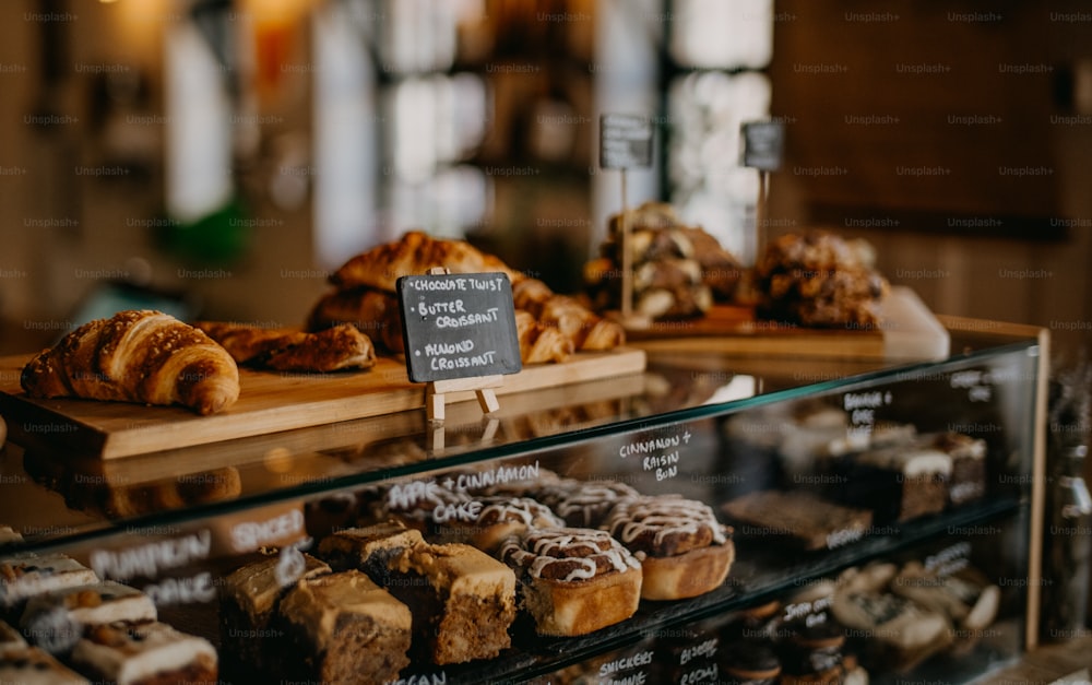 a display case filled with lots of different types of pastries