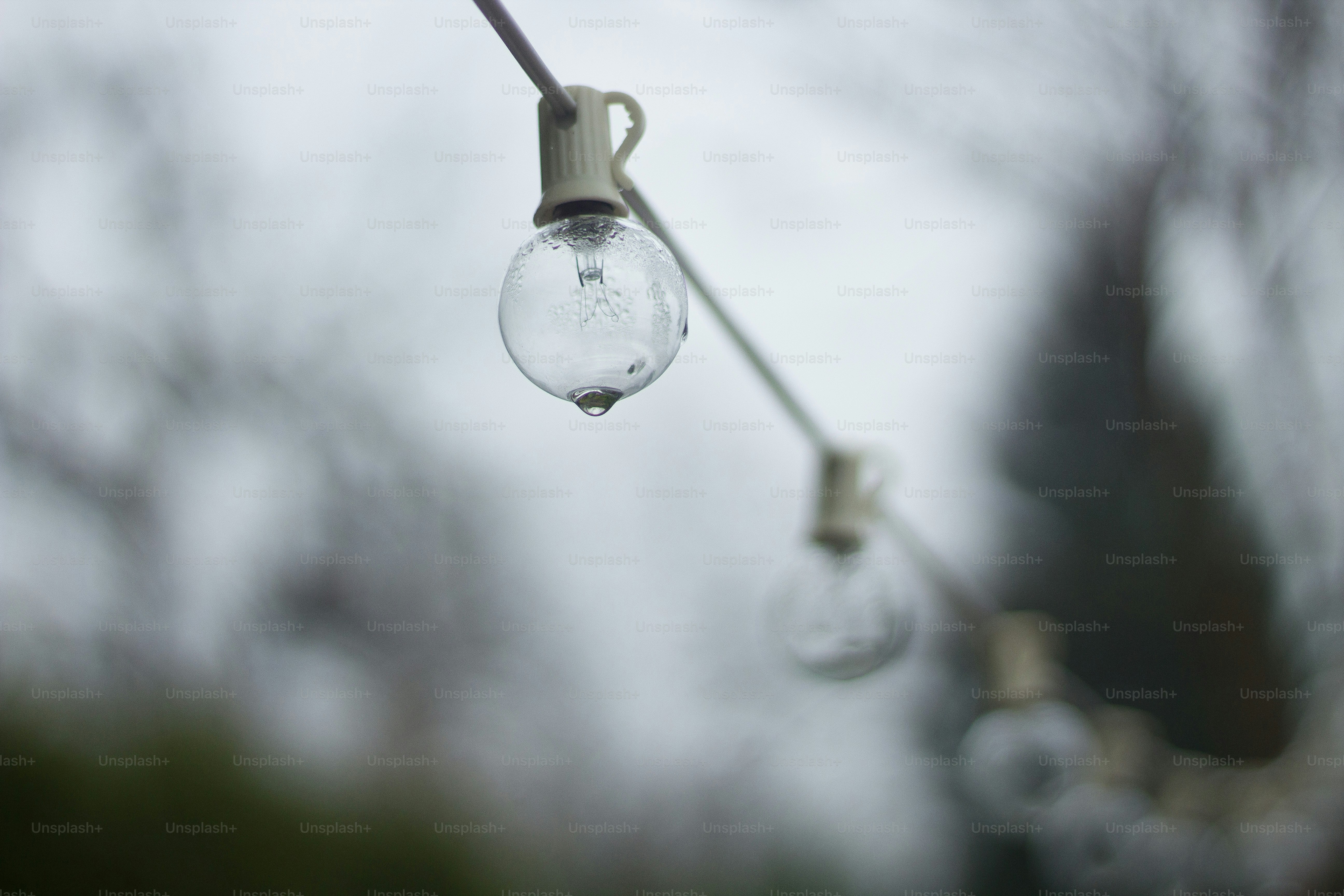 a couple of light bulbs hanging from a wire