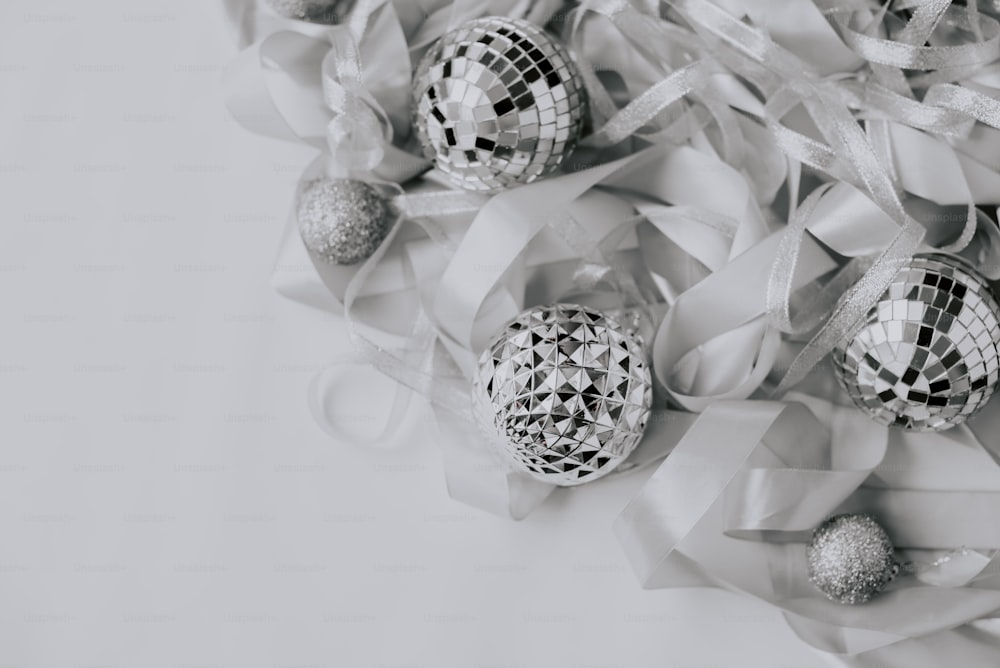 a black and white photo of christmas ornaments
