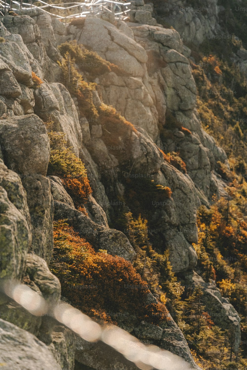 a man riding a snowboard down the side of a mountain