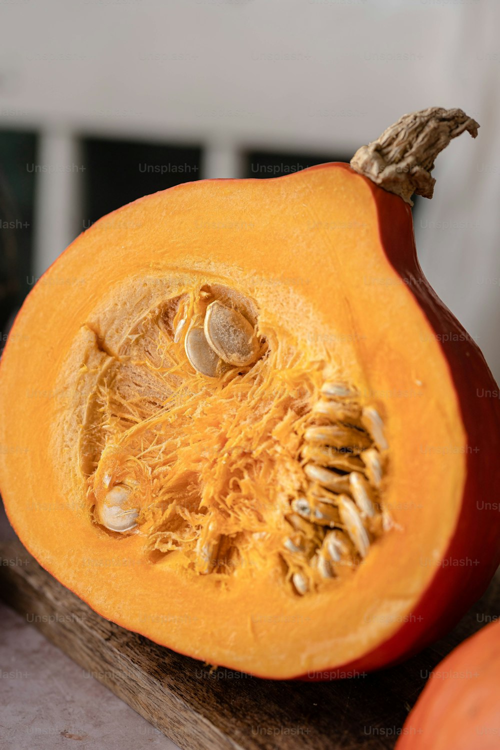 a close up of a pumpkin cut in half