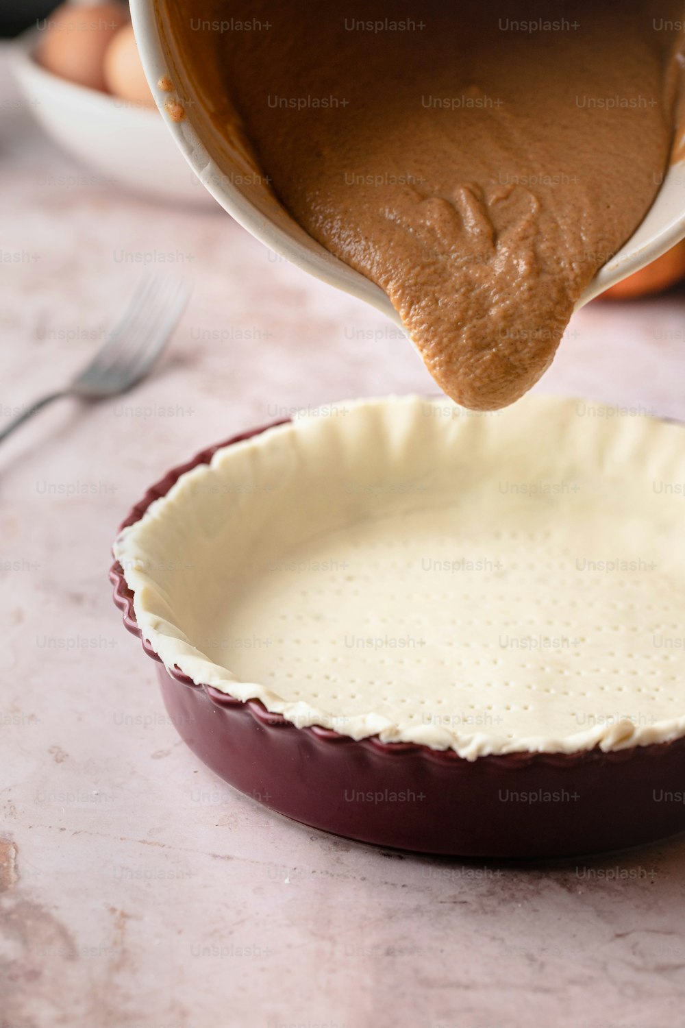 a pie pan with a pie crust in it