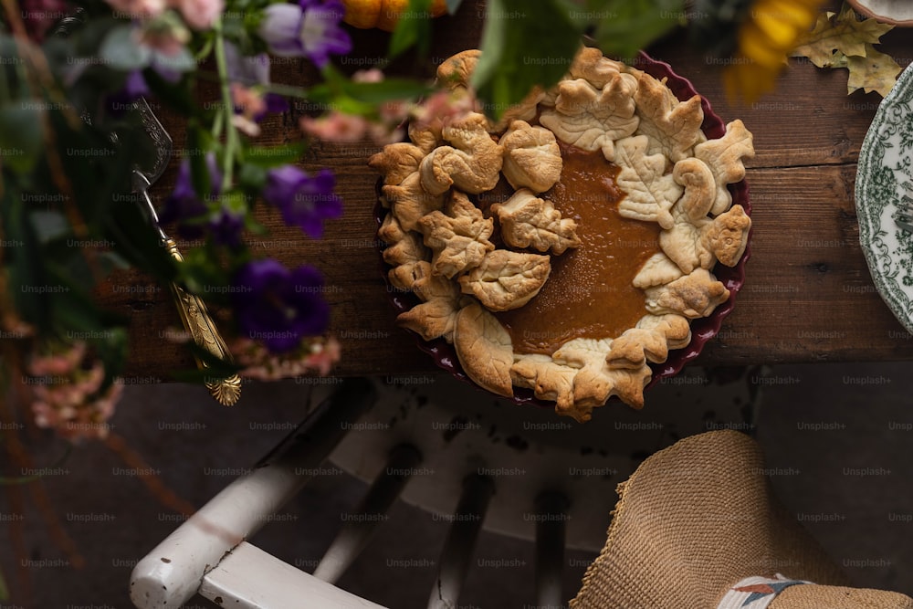 a pie sitting on top of a wooden table