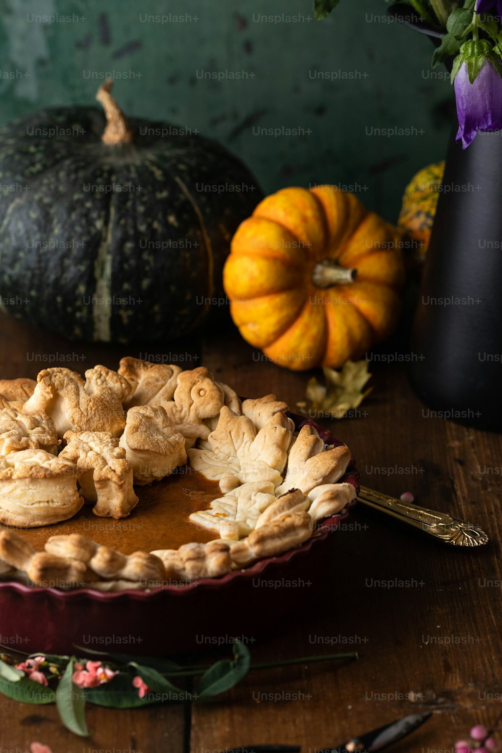 a pie sitting on top of a wooden table