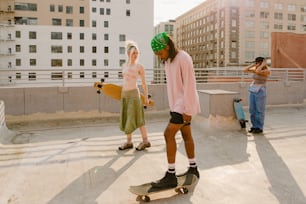 a couple of people that are standing on a skateboard