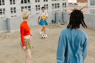 a group of people playing a game of soccer