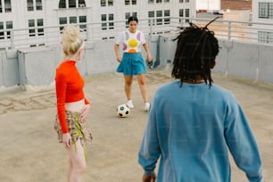 a group of people playing a game of soccer
