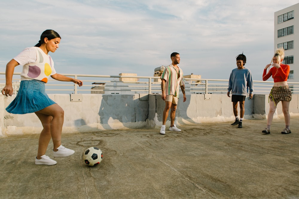 a group of young people playing a game of soccer