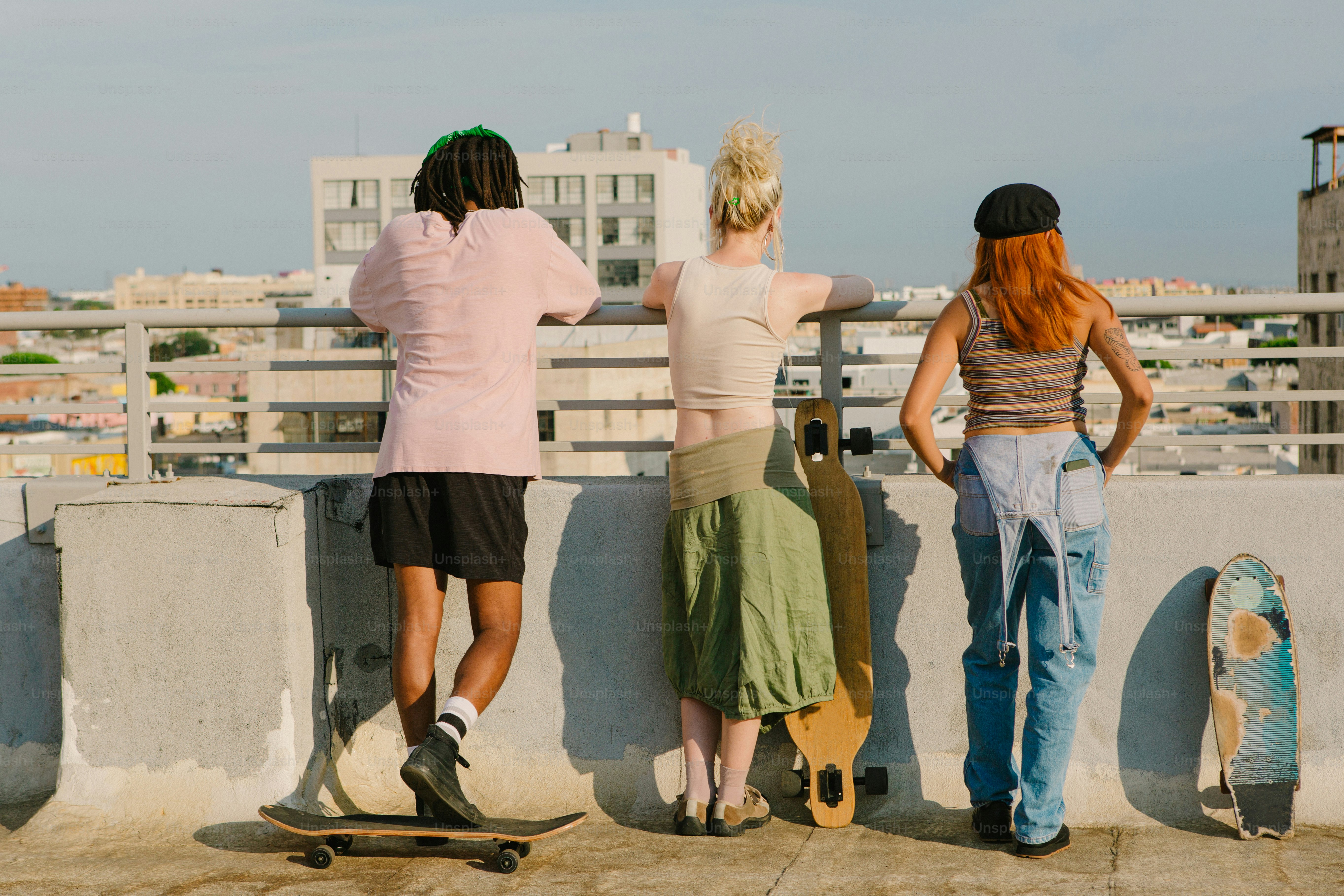 a group of three people standing next to each other