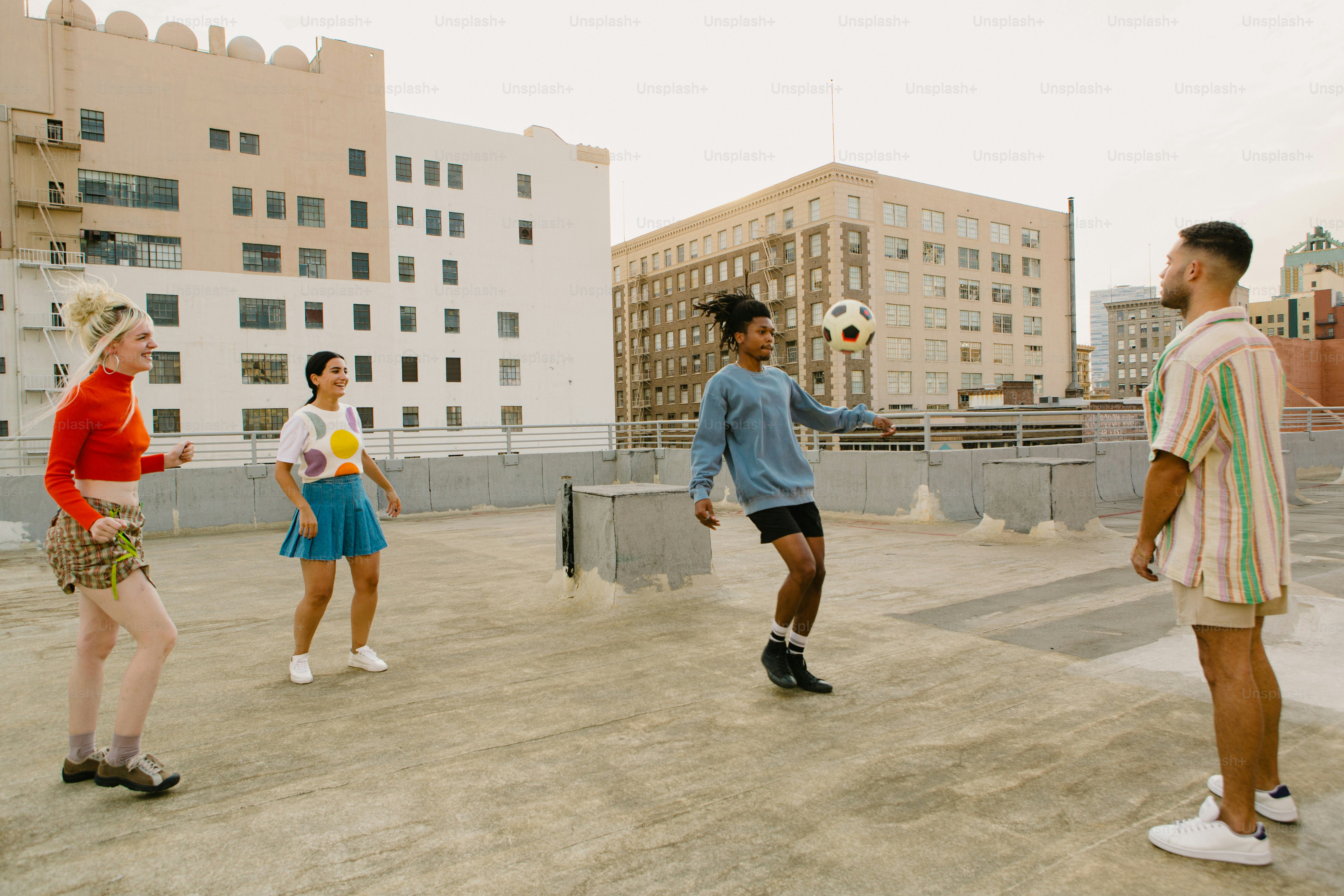 a group of young people playing a game of soccer