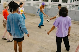 a group of people playing a game of soccer