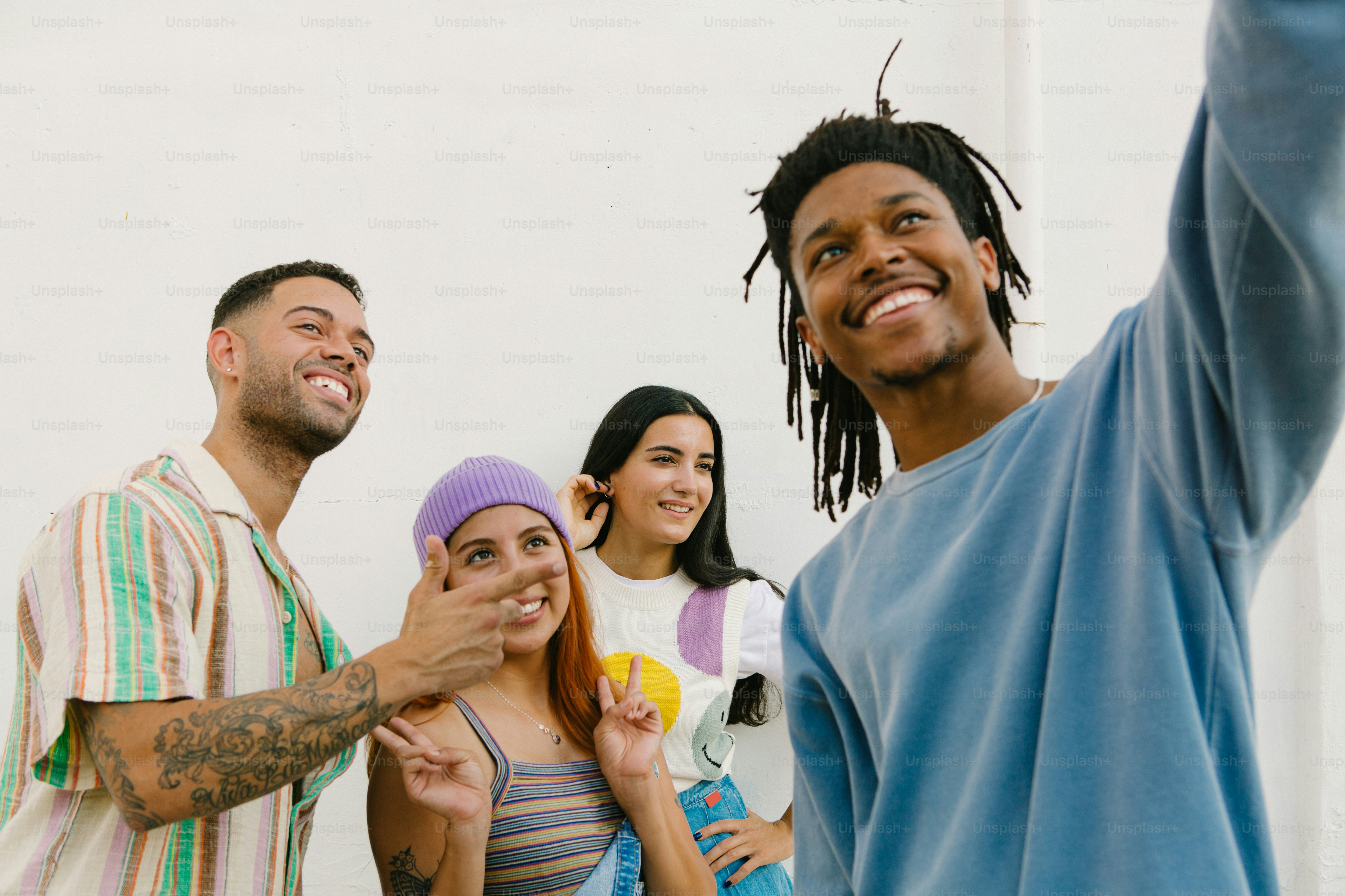 a group of young people standing next to each other