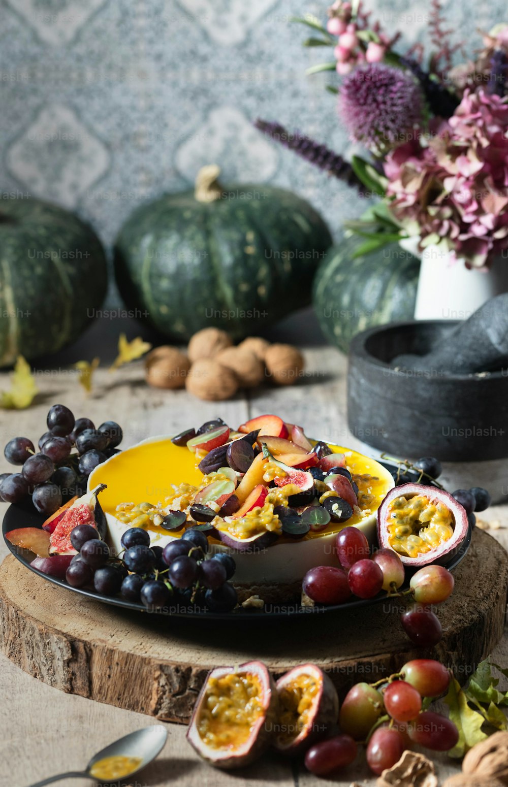 a plate of fruit and vegetables on a table