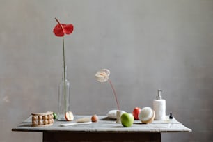 a wooden table topped with a vase filled with flowers