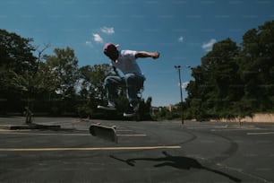 a man flying through the air while riding a skateboard